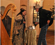 Lynn Harrington buying harp music in the Banff Chateau